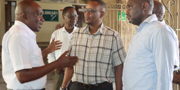 Bandari Maritime Academy (BMA) CEO Dr. Eric Katana engaging with ICS Chairman Elijah Mbaru and other leaders during ICS Open day | Photo Courtesy